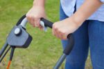 320V Wheeled Electric Lawnmower – 1300 W Motor, 32 cm Cutting Width, 30 Litre Grass Box, Soft Grip Handles, Orange and Grey - Image 6