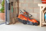 320V Wheeled Electric Lawnmower – 1300 W Motor, 32 cm Cutting Width, 30 Litre Grass Box, Soft Grip Handles, Orange and Grey - Image 7